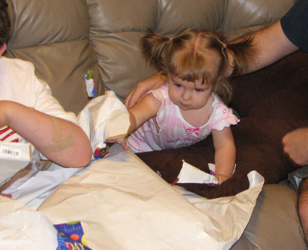 Jessica Reaching for the Wrapping Paper