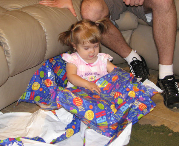 Jessica Playing with the Wrapping Paper