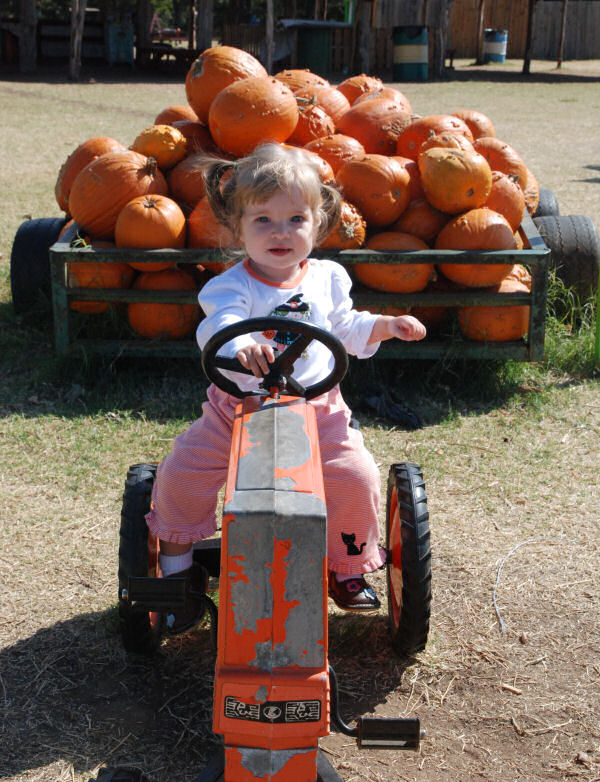 Jessica Riding a Tractor