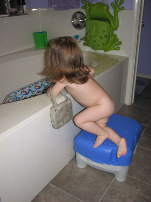 Taking Her Purse to Bathtime, 2/23/11