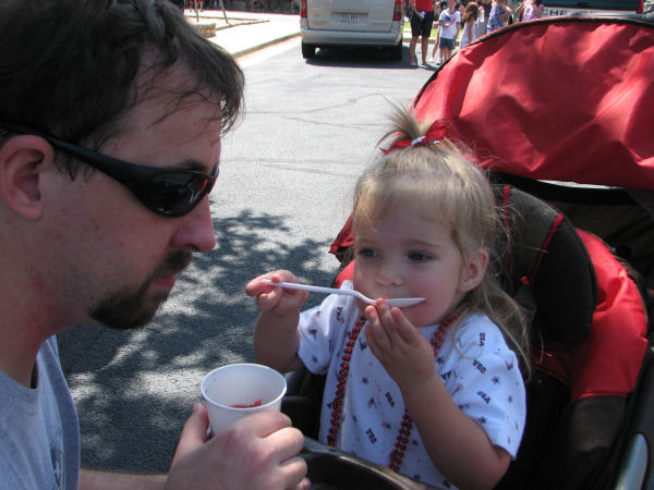 Sharing a Snow Cone with Daddy