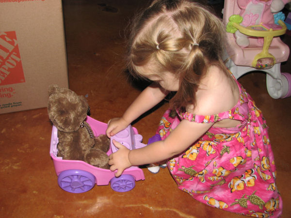 Giving a Teddy Bear a Ride in Her Princess Carriage, 6/30/11